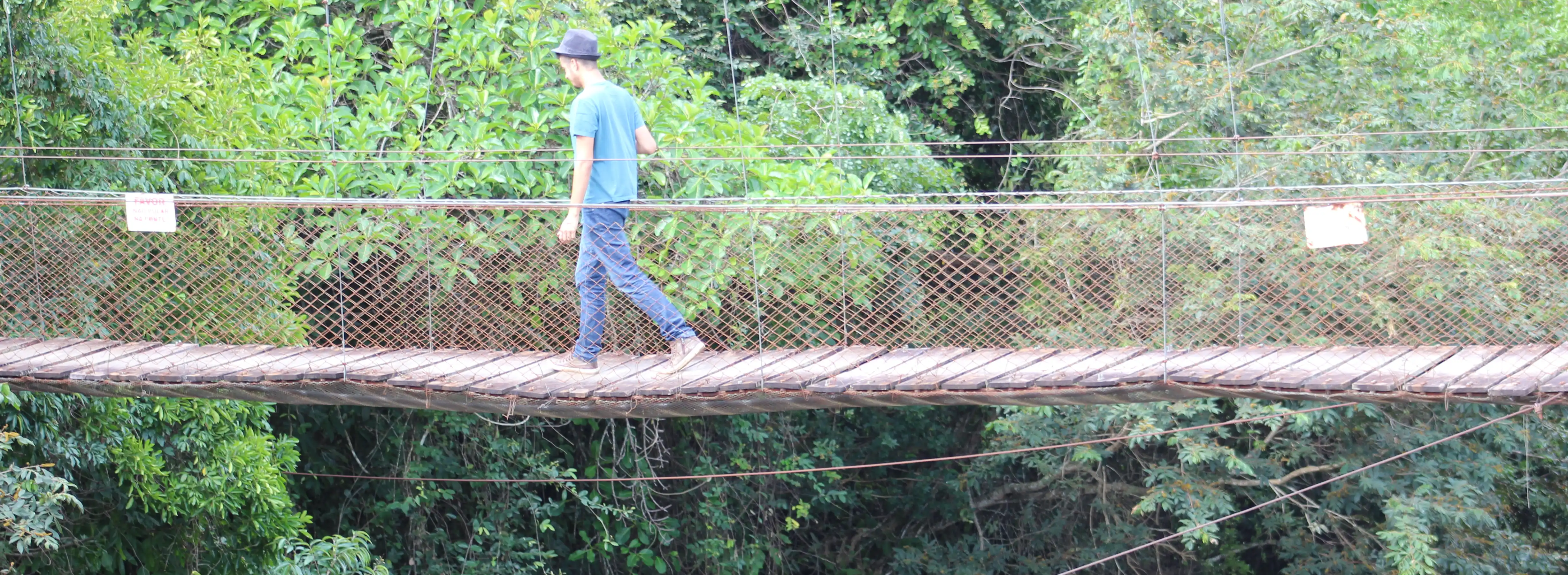 Rafael walking a bridge